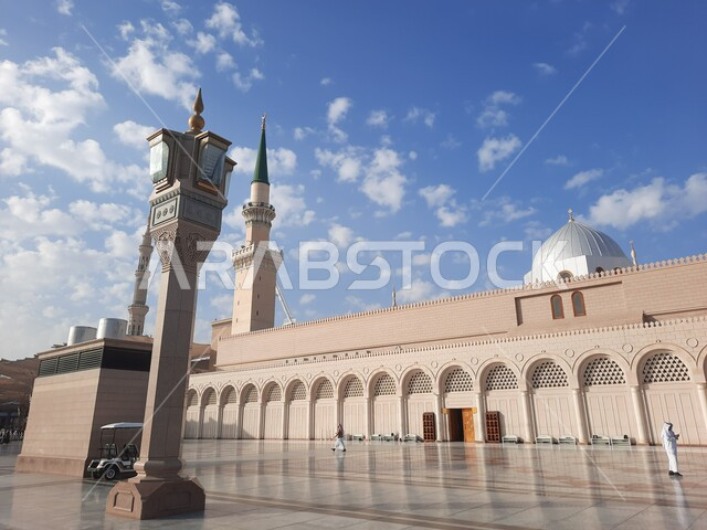 The Prophet's Mosque in Madinah, Saudi Arabia, the courtyard of the Prophet's Mosque, the Noble Sanctuary of the Prophet, Islamic holy places, the minaret of the mosque, Islamic religious landmarks