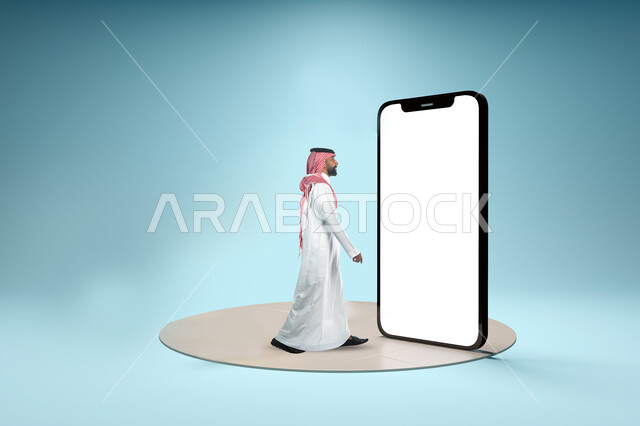 بورتريه لرجل عربي خليجي سعودي، المشي والتقدم للأمام، منظر جانبي لرجل بإيماءات وجه ويدين تدل على الحركة، هاتف محمول كبير الحجم، شاشة بيضاء فارغة، خلفية زرقاء