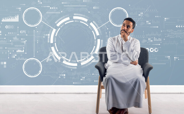 رجل عربي خليجي سعودي يجلس على الكرسي ويضع يده على ذقنه، ايماءات وجه ويدين تدل على التفكير والحيرة،التمعن والتركيز، التأمل والتخطيط، ايقونات ورموز، افكار وحلول، التفكير بالمستقبل، عناصر هلوجرامية ثلاثية الابعاد