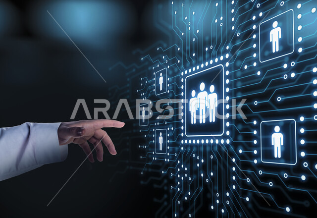 صورة مقربة ليد رجل عربي خليجي سعودي يقوم بلمس لوحة شبكية، شريحة مضيئة، ايقونات ورموز شبكية، تقنيات حديثة، تكنولوجيا المستقبل، الذكاء الاصطناعي، تطور التكنولوجيا الرقمية