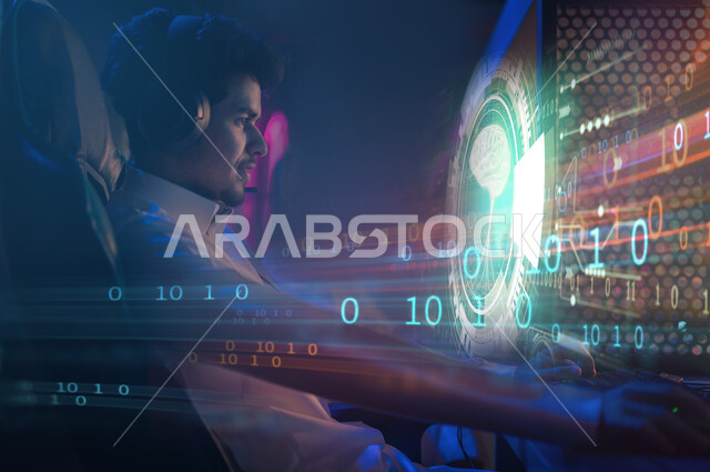 A young Saudi Arabian Gulf man using a computer, working in the development of computer networks and software systems, working remotely, using programming languages, codes and algorithms, software codes using the 3D hologram technology