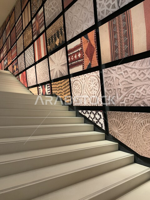 National Museum of Qatar stairs, various archaeological paintings, tourism and travel, heritage tourist places