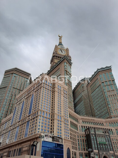 Clock tower hotels overlooking the Haram in Makkah Al-Mukarramah, Saudi Arabia, performing the rituals of Hajj and Umrah, worship and drawing closer to God, Islamic religious landmarks, luxury hotels, architectural art, the Sacred Mosque Square, the Holy 
