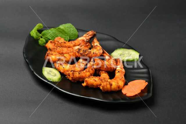 Shrimp dish on a black surface, Arabic kitchens and restaurants, shrimp, seafood