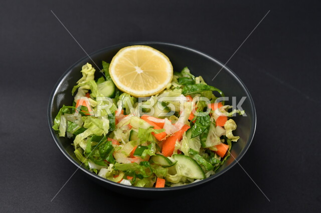 Vegetable salad plate on blacktop, healthy plate, cold appetizer, healthy food diet