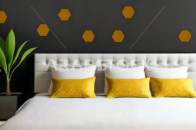 A bedroom in a residential apartment with modern and attractive designs, wonderful decorations, elegant home furnishings, luxurious modern designs, elegant tourist apartments, hotels, luxury hotels