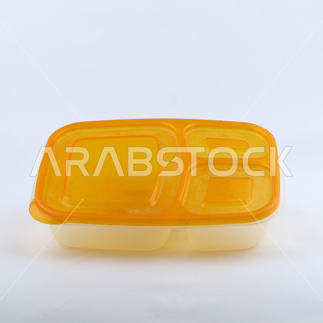 Plastic box for preserving food, meal boxes, food preservation box, food tools, white background, plastic utensils