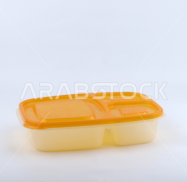 Plastic box for preserving food, meal boxes, food preservation box, food tools, white background, plastic utensils