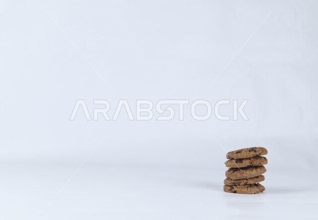 Set of chocolate chip cookies, crispy wafers, cookies, chocolate biscuits, freshly baked sweets, white background
