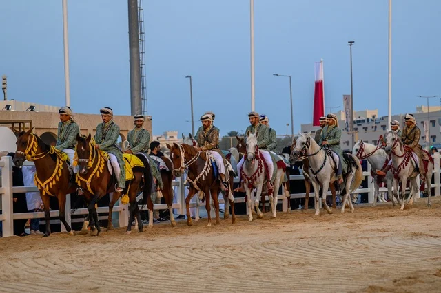 Traditional Qatari Horse Riders Parade in Doha Qatar - Photo