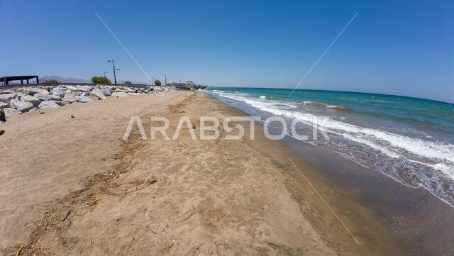 Photography of golden beach in Muscat, Oman during sunny spring day - Photo