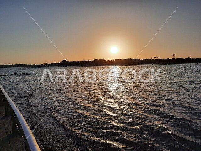 Aesthetic image of the Red Sea beach in Jeddah, Saudi Arabia at sunset, nature background, recreational tourist places, calm and beauty of the sea, Jeddah Corniche at sunset, sunset on the beach of Jeddah