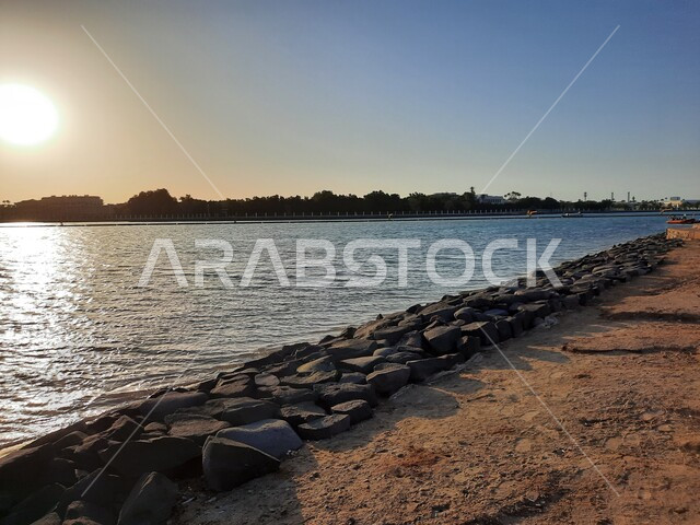 Aesthetic image of the Red Sea beach in Jeddah, Saudi Arabia at sunset, nature background, recreational tourist places, calm and beauty of the sea, Jeddah Corniche at sunset, sunset on the beach of Jeddah