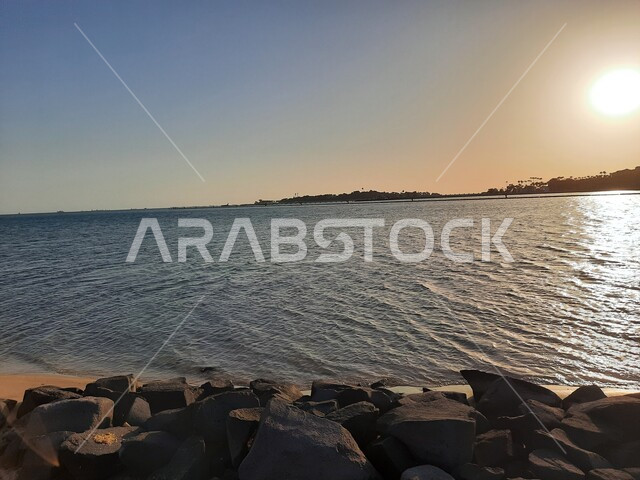 Aesthetic image of the Red Sea beach in Jeddah, Saudi Arabia at sunset, nature background, recreational tourist places, calm and beauty of the sea, Jeddah Corniche at sunset, sunset on the beach of Jeddah