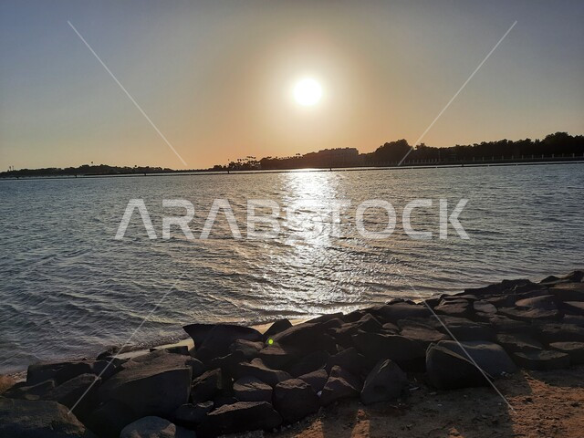 Aesthetic image of the Red Sea beach in Jeddah, Saudi Arabia at sunset, nature background, recreational tourist places, calm and beauty of the sea, Jeddah Corniche at sunset, sunset on the beach of Jeddah