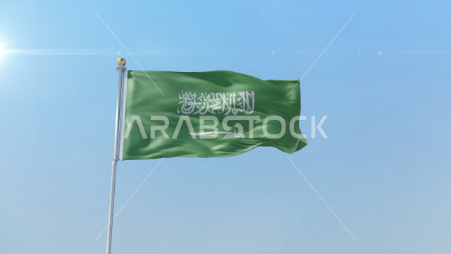 العلم الوطني السعودي يرفرف عاليا وقت النهار في سماء المملكة ، الإحتفال باليوم الوطني السعودي ، العيد الوطني للمملكة ، راية التوحيد و الإسلام ، المملكة العربية السعودية