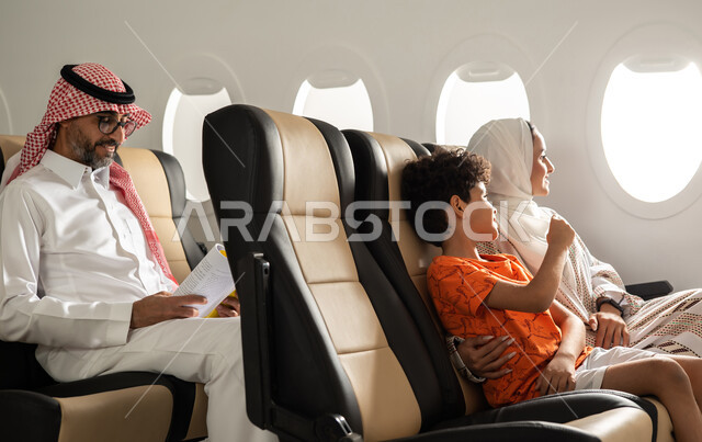 A man wearing traditional Saudi dress and medical glasses and spending ...