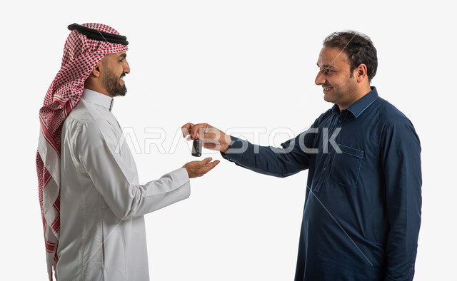 Portrait of a Pakistani car driver wearing traditional Pakistani dress, handing over car keys, a Saudi Gulf man wearing traditional Saudi dress, professions and jobs, smiling face gestures, recruiting workers from abroad, mastering work, white background