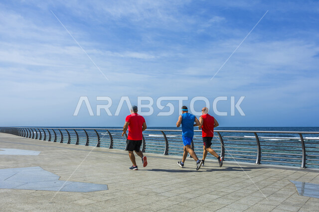 ممارسة الرياضة الصباحية على كورنيش جدة ، واجهة جدة البحرية ، أماكن سياحية ترفيهية بالسعودية ، الإستجمام والترفيه ، المحافظة على اللياقة والصحة الجيدة , الطبيعة والأجواء الصباحية .