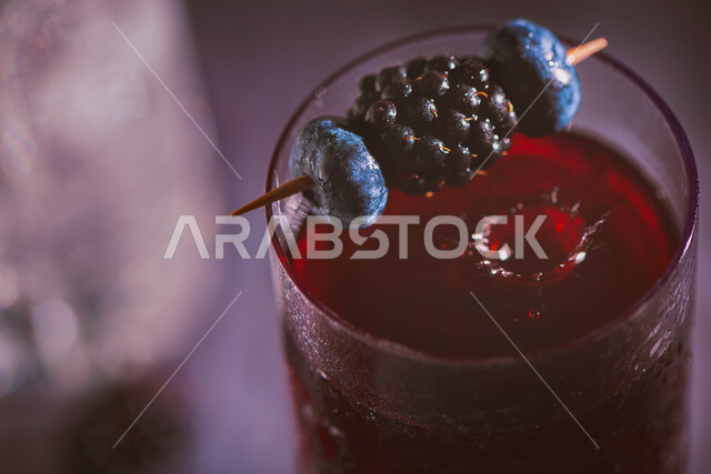 A close-up of fresh raspberry juice, a drink with blackberries, cold drinks, delicious natural juices, refreshing juice