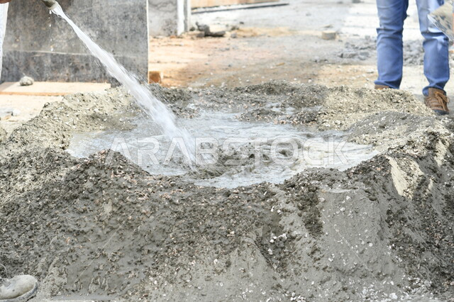 صورة مقربة لاسمنت مخلوط بالحصى، تحضير وتجهيز الاسمنت، اعمال البناء، خلط الاسمنت