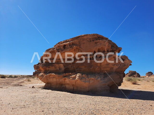 Rock formations in Madain Saleh in Al-Ula in Saudi Arabia, historical monuments, rocky peaks and heights, desert nature, tourism in Saudi Arabia