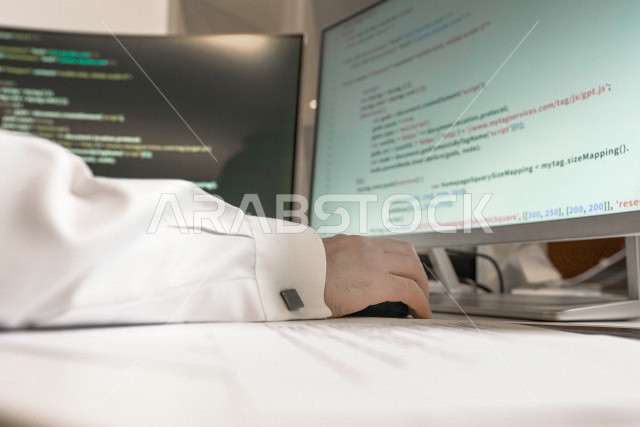 Portrait of a Saudi Arabian Gulf programmer who is fluent in entering ...