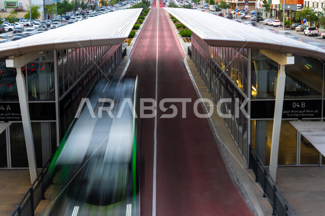 .Buses street in the city of Riyadh during the day, the roads and streets of Riyadh, the architectural art, the crowded bus stations