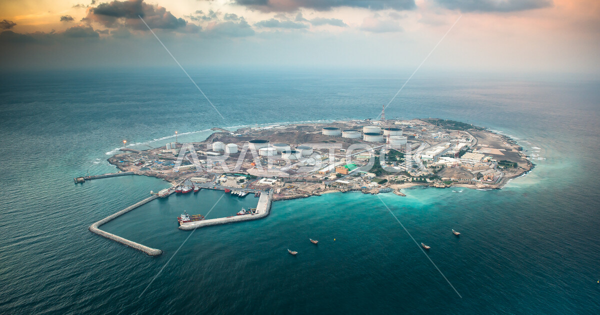 An overhead view of Halul Island in the State of Qatar, cloudy sky, oil