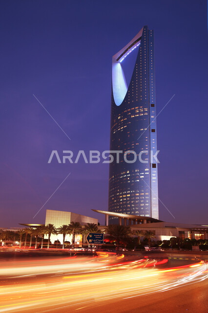 A picture from the bottom of the Kingdom Tower in the city of Riyadh, downtown, the architectural art of towers and skyscrapers, the Kingdom of Saudi Arabia, famous landmarks, the sky and landscapes in Riyadh