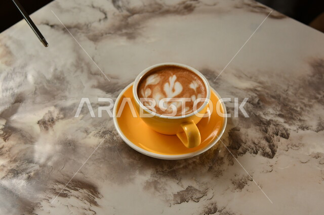 Cup of coffee with thick foam, hot cappuccino drink, delicious hot drinks, hot coffee cup, gray background.