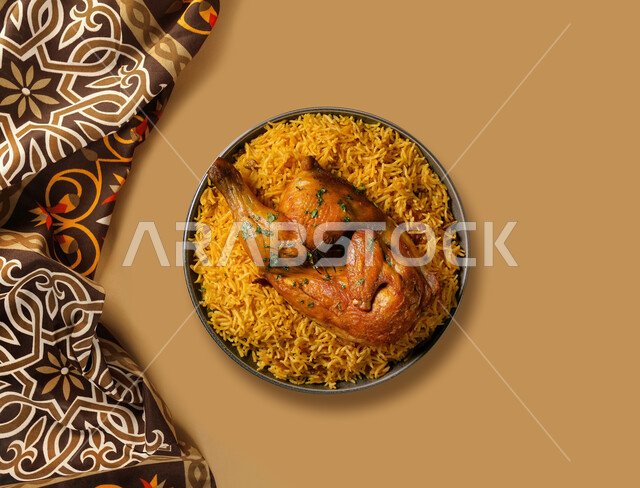 A dish of Kabsa rice with chicken, traditional Gulf Arab meals, popular dishes, oriental restaurants for Saudi cuisine recipes, brown background