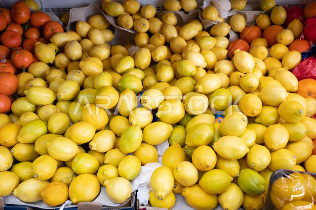 Close-up of the lemon fruit inside the supermarket, shops, buying household needs, commodities and various foodstuffs, consumer supplies.