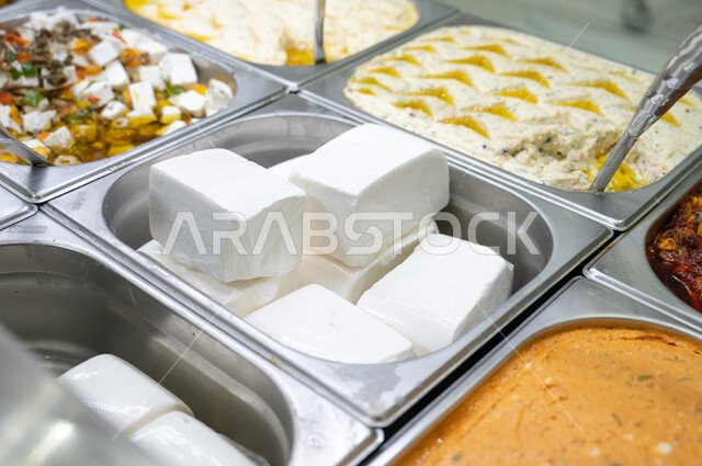 Assortment of fresh appetizers in the store, goods and foodstuffs, snack, light and healthy food assortment, assorted cold appetizers.