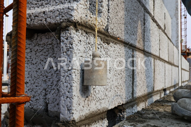 بناء جدار من الطوب والاسمنت، قالب طوبي، اعمال البناء، حائط حجري، ادوات ومعدات البناء