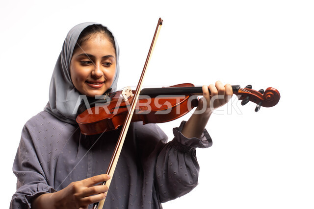 Practicing the hobby of playing with a stringed violin, presenting ...