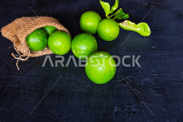 Pieces of fresh lemon, vitamin C, refreshing and delicious fruit, natural vitamin, citrus fruits, on a black background.