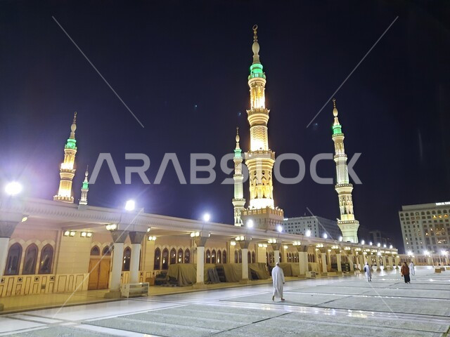 The square of the Prophet's Mosque in Medina at night in the Kingdom of Saudi Arabia, Islamic religious landmarks, the Prophet's Mosque, Islamic holy places.