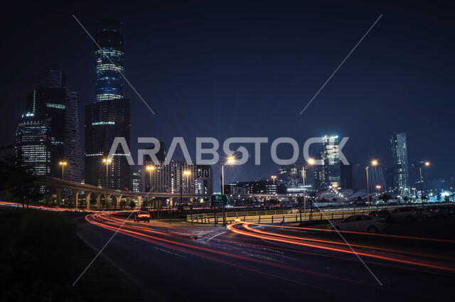 Car traffic in the streets of Riyadh at night, King Abdullah Financial District (KAFD) towers, towers and skyscrapers in Riyadh, Saudi Arabia, architectural art, famous towers and landmarks of Riyadh