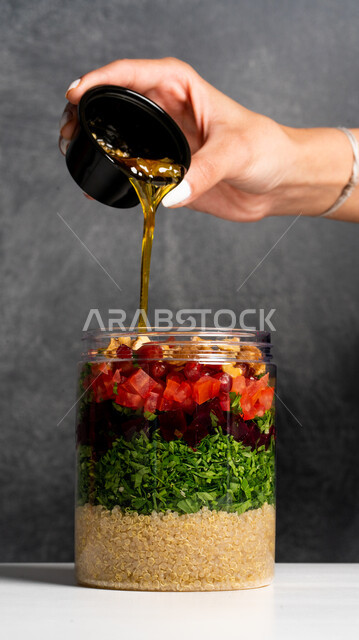 Vegetable salad dish and healthy dish, cold appetizers, healthy diet, tabbouleh salad, healthy diet meals, healthy food restaurants, gray background