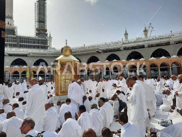 Pilgrims of the Sacred House of God performing prayers in the Holy Mosque of Mecca, performing the rituals of Hajj and Umrah, the Kaaba in Mecca, the Kingdom of Saudi Arabia, Islamic holy places