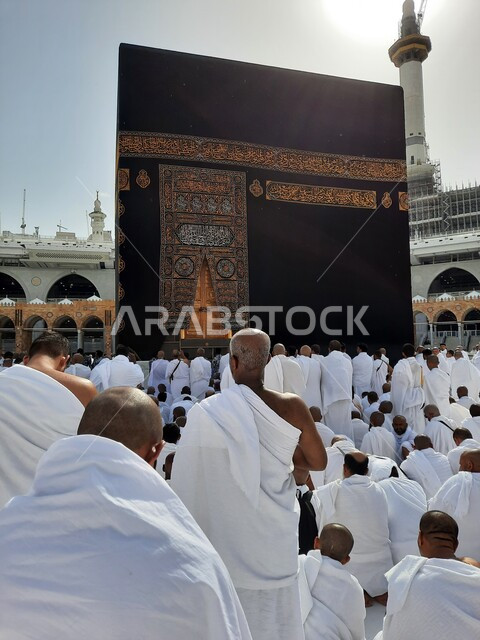 Pilgrims of the Sacred House of God performing prayers in the Holy Mosque of Mecca, performing the rituals of Hajj and Umrah, the Kaaba in Mecca, the Kingdom of Saudi Arabia, Islamic holy places