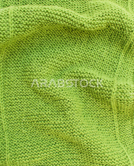 Knitting wool threads, sewing and embroidery skill, wool knitting needle, handicrafts, green cloth background