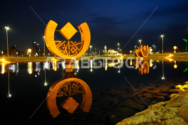 Islamic figures in Khobar Corniche Lake at night, architectural art, waterfront on the Red Sea coast, famous tourist attractions in the Kingdom of Saudi Arabia.