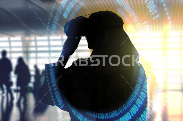 اكواد وخوارزميات لغة الرمجة، صورة ظلية من الخلف لامراة عربية سعودية خليجية ترتدي نظارة الواقع الافتراضي، محاكاة العالم الافتراضي، خلفية رسوم هولوجرامية ثلاثية الابعاد لبيانات رقمية، استخدام التقنية والتكنولوجيا المتطور في التسلية والترفية