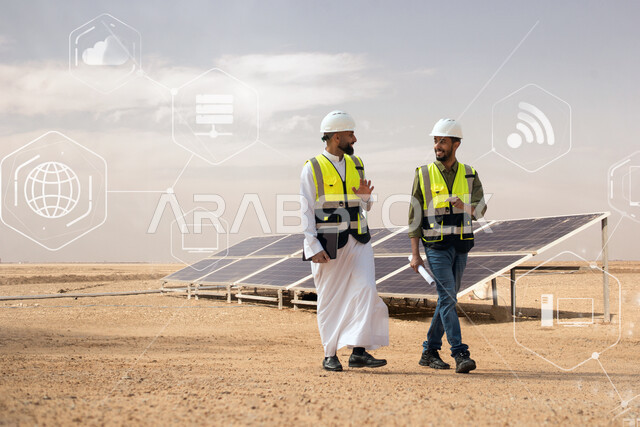 مخططات وتصاميم هندسية، مهندسان طاقة خليجيان عربيان سعوديان يشرفان على محطات الطاقة الشمسية في السعودية، حوارات ونقاشات عمل، إرتداء خوذة وسترة الحماية الخاصة بالعمل، الطاقة النظيفة المتجددة، التدقيق والاشراف على العمل
