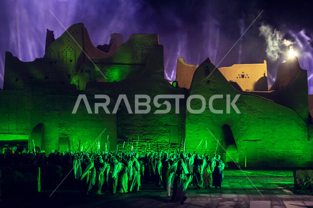 The traditional Saudi folk performance and dance, celebrations and festivals in Riyadh in the Kingdom of Saudi Arabia, a group of Saudi Arab Gulf men, the opening ceremony of the Al-Bujairi National Park and Heritage Park in Diriyah, the historical Diriya