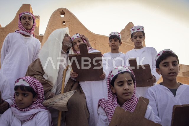 Diriyah Development Project, a group of young children dressed in traditional Saudi costume at the opening ceremony of the Al-Bujairi National Heritage Park in Diriyah, celebrations and festivals in Riyadh in the Kingdom of Saudi Arabia, historical and ar