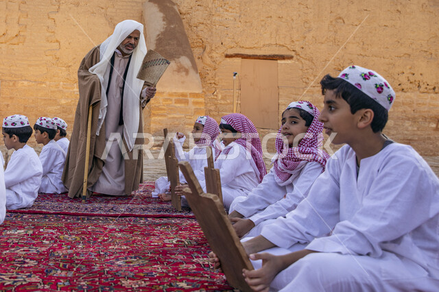 Historical, heritage, archaeological and tourist attractions, the Diriyah development project, a group of young children dressed in traditional Saudi costume at the opening ceremony of the Al-Bujairi National Park and Heritage Park in Diriyah, celebration