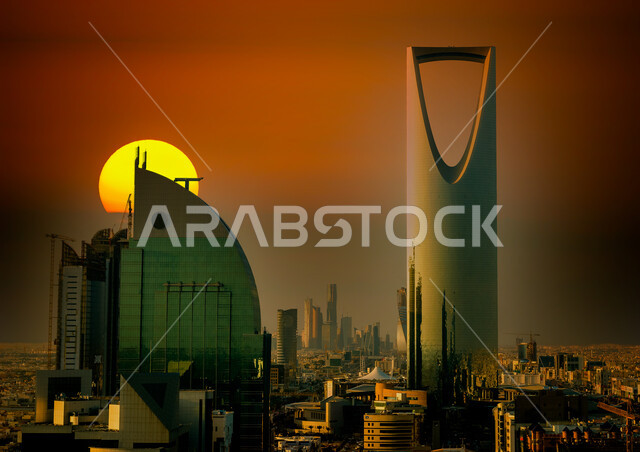 الابراج وناطحات السحاب وقت غروب الشمس، برج المملكة في مدينة الرياض في السعودية، الفن الهندسي المعماري، ابراج ومعالم الرياض المشهورة